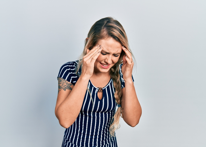 woman having a headache